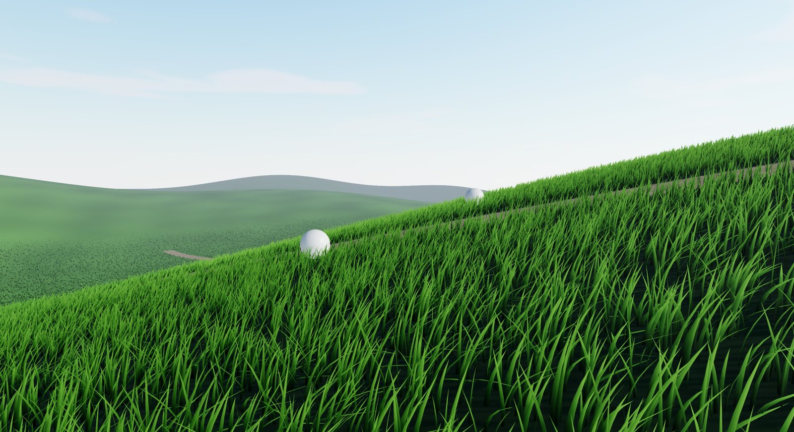 A dense meadow on rolling hills, with balls rolling through the grass. Click to open the live demo