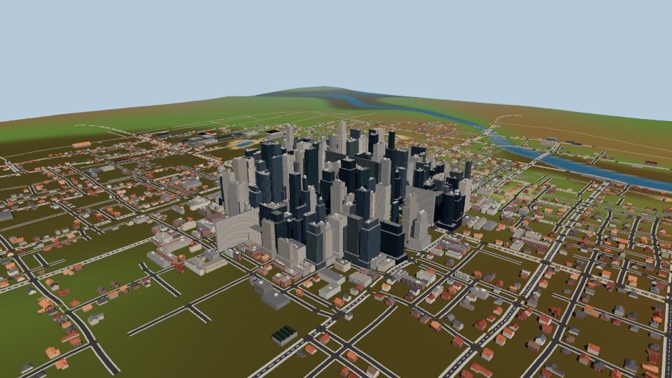 threejs-city: Downtown towers rising from a street grid of houses beside a river