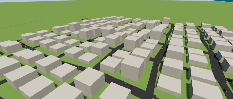 threejs-vehicles: Cars driving a street grid between rows of block buildings